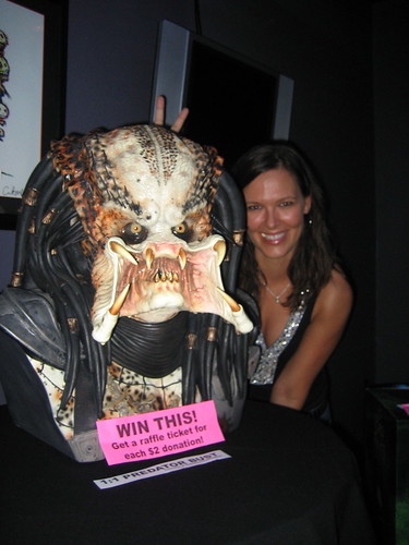 posing with the Predator bust